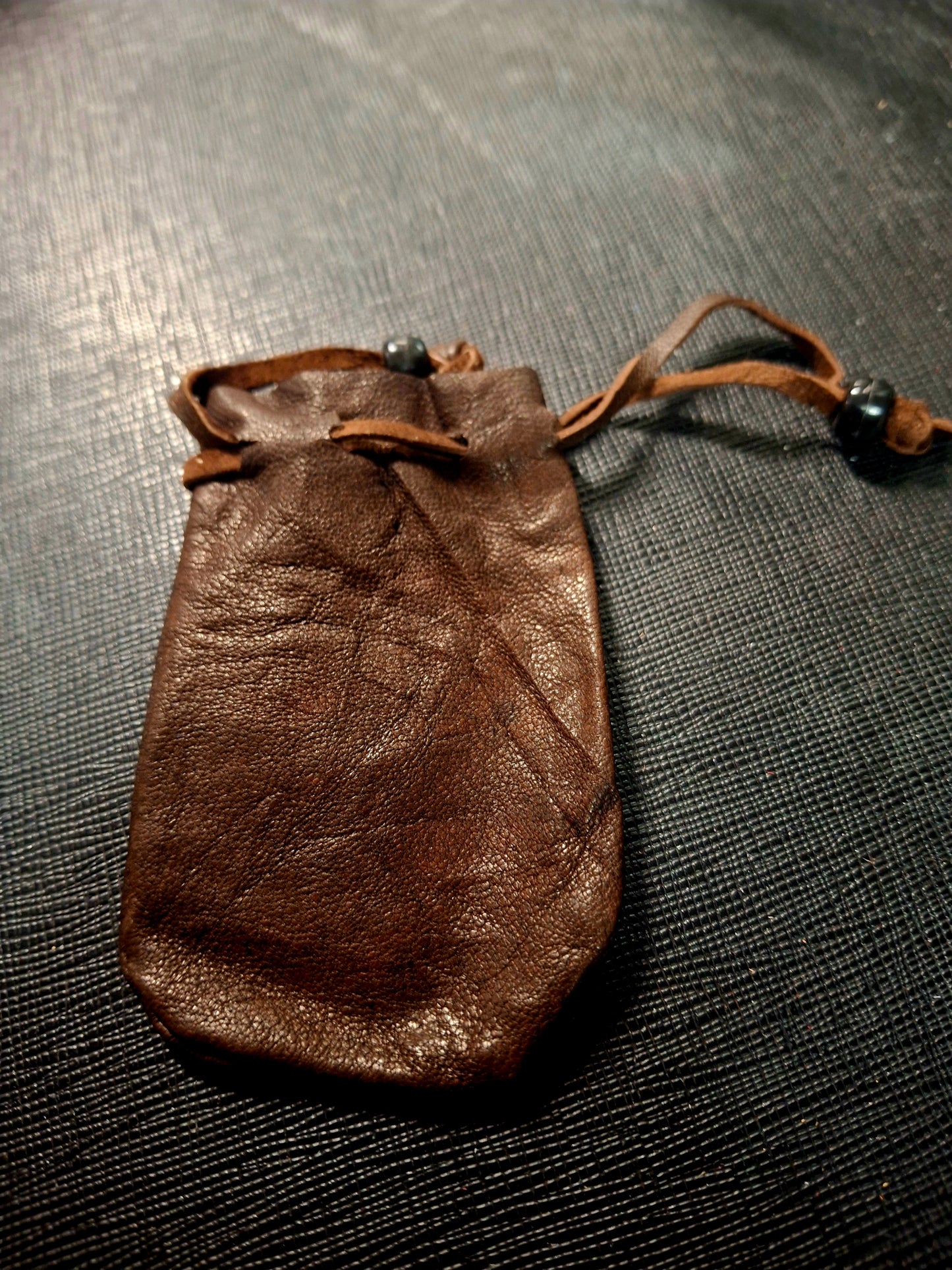 Brown Color Leather Drawstring Pouch/Bag 3x2" - 1 inch opening (Approx.) *Please note: Brown colors will vary in variations shades of brown**