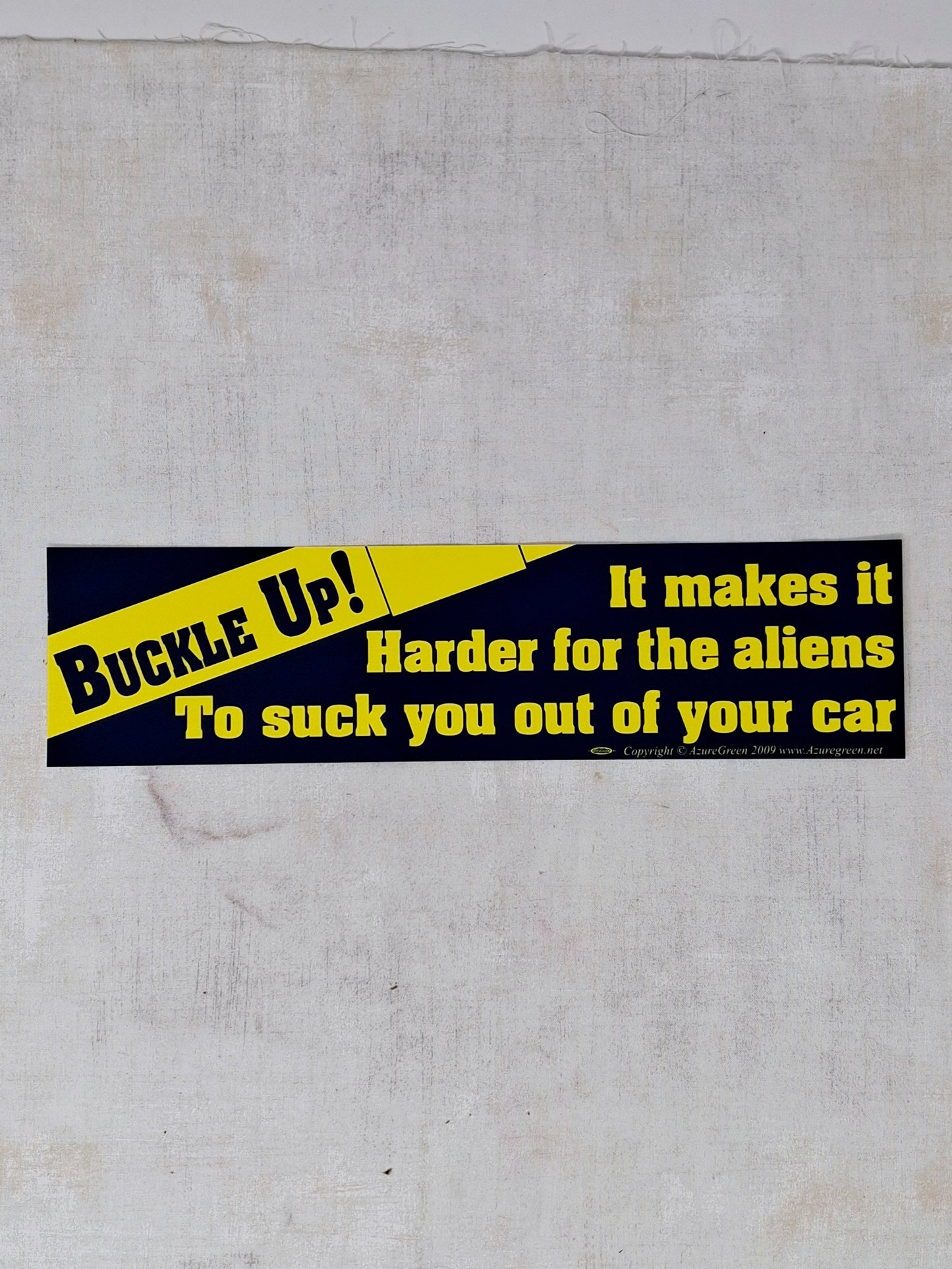 Bumper Sticker - Buckle Up It Makes It Harder For The Aliens To Suck You Out Of Your Car