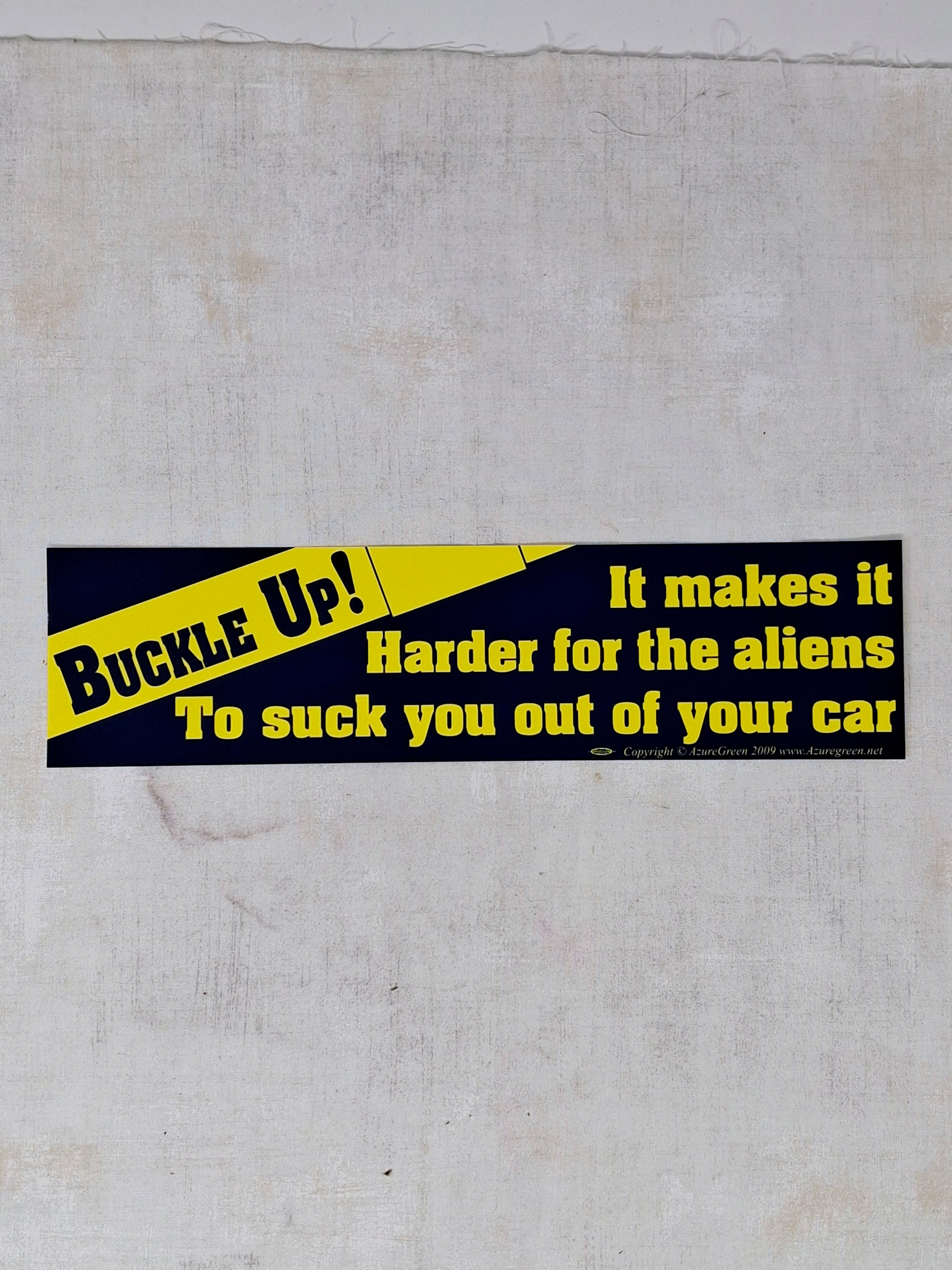 Bumper Sticker - Buckle Up It Makes It Harder For The Aliens To Suck You Out Of Your Car